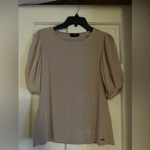 Cream blouse with fun pleated sheet sleeves